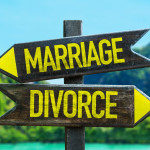 Marriage - Divorce signpost in a beach background